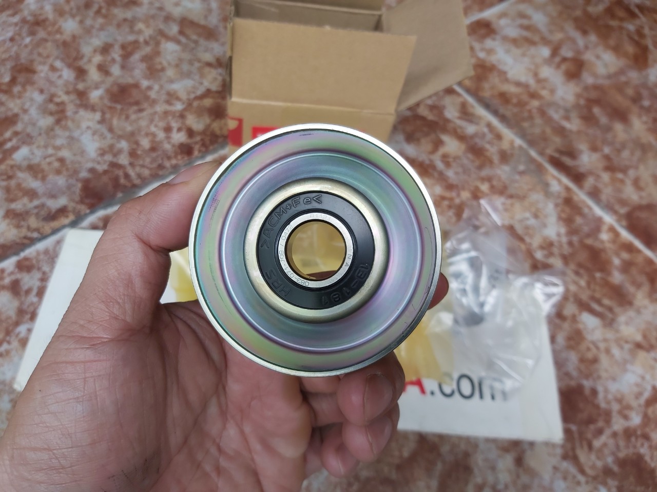 Bi tăng dây curoa máy phát xe Honda CRV